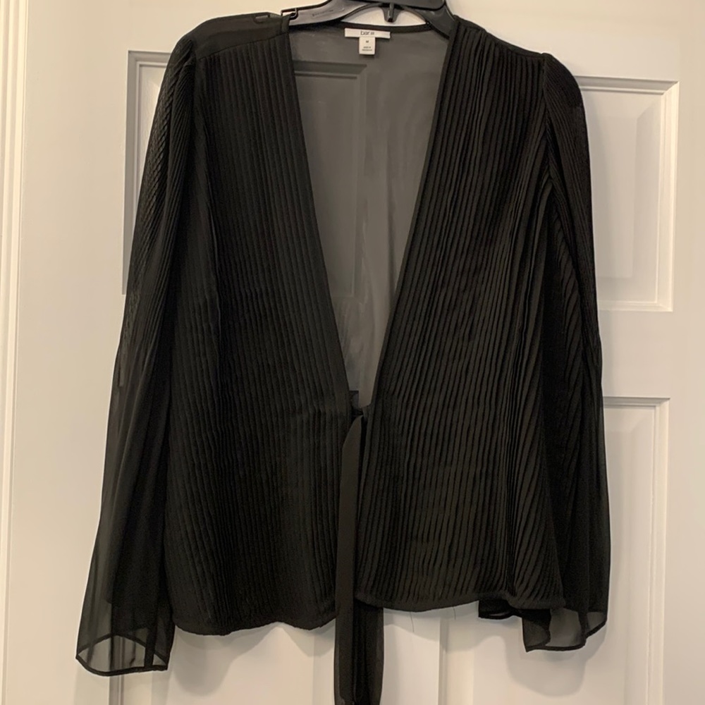Fun black tight in the front mesh blouse